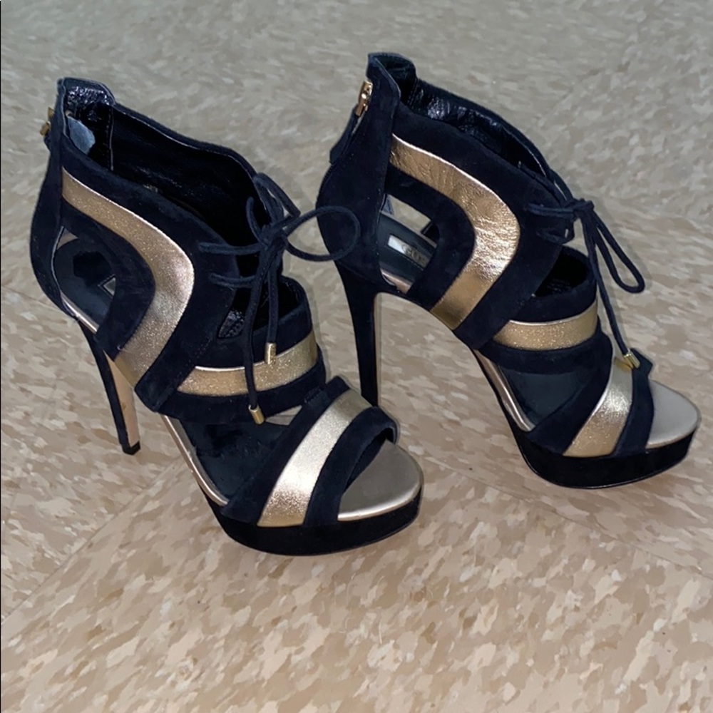 Black and gold heels